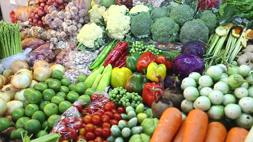 Greens and vegetables variety in market stall